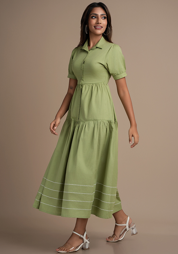 AVA GREEN DRESS WITH DECORATIVE LINES