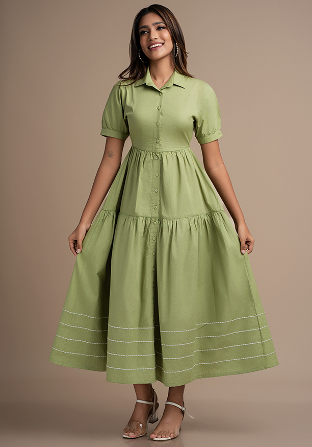 AVA GREEN DRESS WITH DECORATIVE LINES
